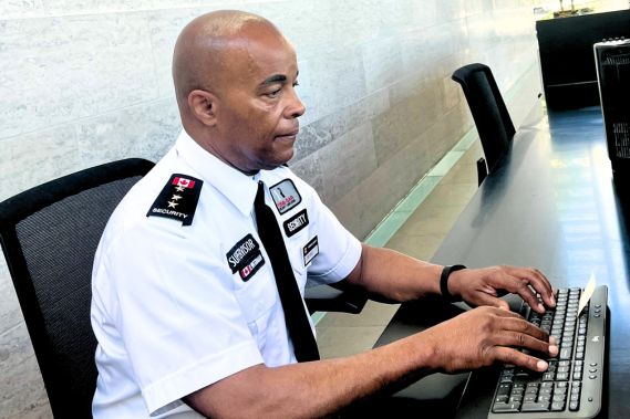 one-Gar security officer managing surveillance and incident reports